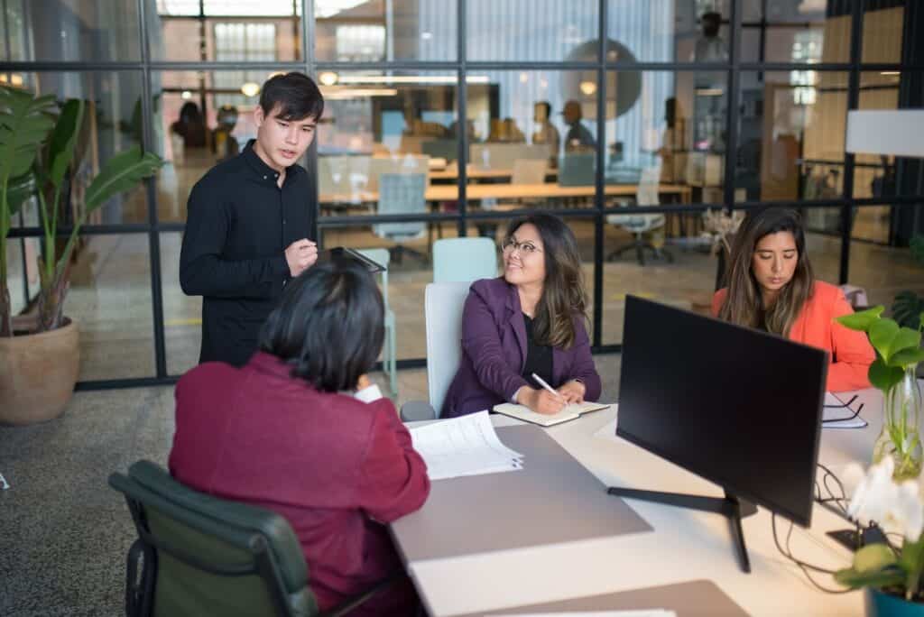 Superlanet team members collaborating in a modern office setting