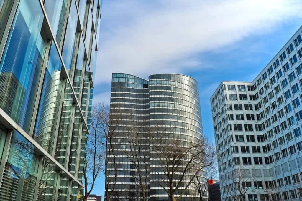 Modern glass office buildings representing Superlanet's new Tijuana office
